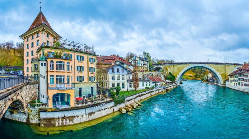 Panorama of Aare river with riverside houses and arched bridges, Bern, Switzerland royalty free stock photos