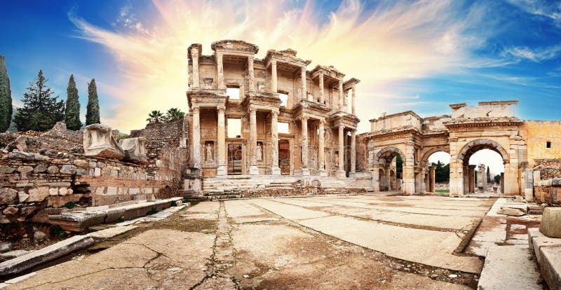 Panorama of ancient library of Celsus in Ephesus under dramatic sky royalty free stock images