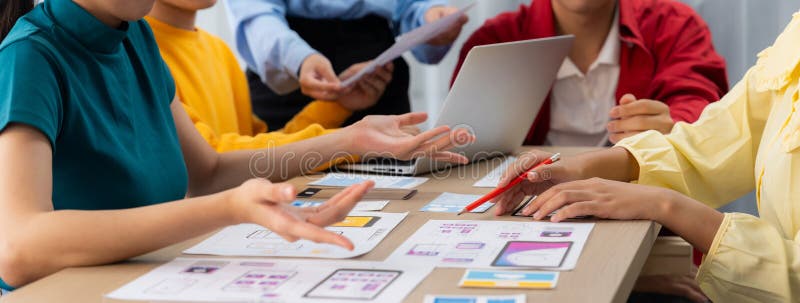 Panorama banner of startup company employee planning on user interface. Synergic. Panorama banner of startup company employee planning on user interface prototype for mobile application or website in office. UX UI designer brainstorm user friendly interface plan.