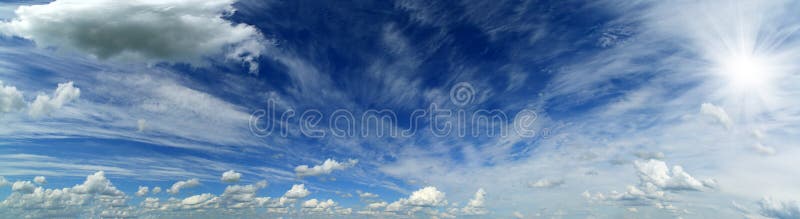 Panorama of beautiful sky with clouds and sun royalty free stock photography