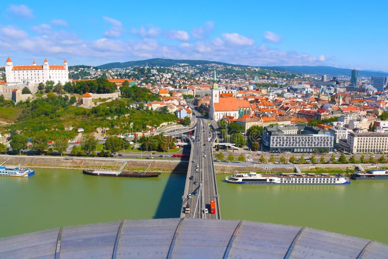 Panorama of Bratislava city, Slovakia. Bratislava castle and St. Martin Cathedral, river Danube
