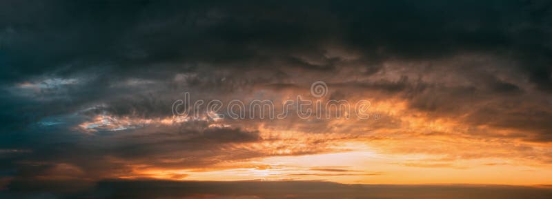 Bright And Dark Blue and Yellow Dramatic Sky Before Thunder. Cloudscape