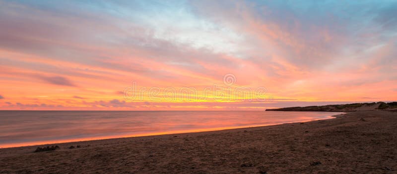 Panorama of Cavendish beach at the crack of dawn