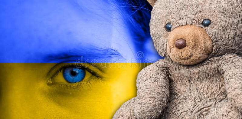 Panorama Childrens eyes full of sadness in Ukraine colors with teddy bear