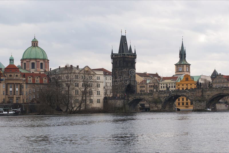 View of Charles Bridge and the bank of the Vltava River. royalty free stock image