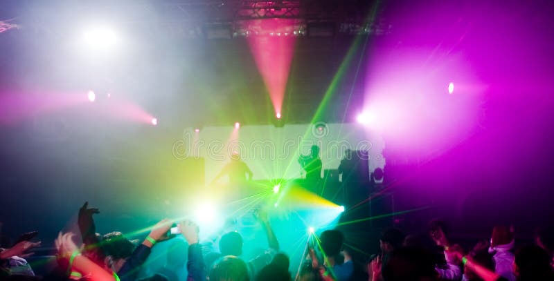 Panorama of a concert, laser show and music. Disco violet light stock images, royalty-free photos and pictures