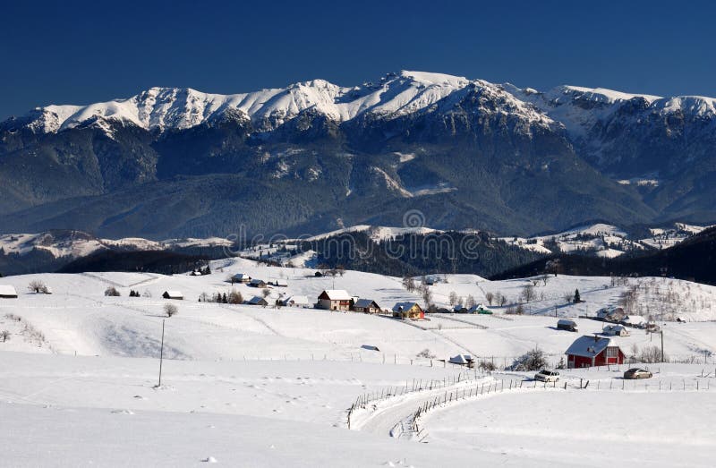 Winter rural landscape in Romania, Sirnea village, Carpathian mountains (Bucegi). Winter rural landscape in Romania, Sirnea village, Carpathian mountains (Bucegi)