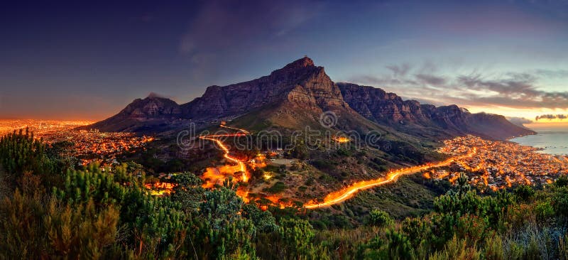 Sunset image of Table Mountain with City lights. Sunset image of Table Mountain with City lights.