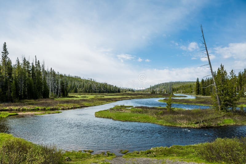 Yellowstone National Park is a national park located primarily in the U.S. state of Wyoming, although it also extends into Montana and Idaho. It was established by the U.S. Congress and signed into law by President Ulysses S. Grant on March 1, 1872.Yellowstone, widely held to be the first national park in the world, is known for its wildlife and its many geothermal features, especially Old Faithful Geyser, one of the most popular features in the park. It has many types of ecosystems, but the subalpine forest is most abundant. It is part of the South Central Rockies forests ecoregion. Yellowstone National Park is a national park located primarily in the U.S. state of Wyoming, although it also extends into Montana and Idaho. It was established by the U.S. Congress and signed into law by President Ulysses S. Grant on March 1, 1872.Yellowstone, widely held to be the first national park in the world, is known for its wildlife and its many geothermal features, especially Old Faithful Geyser, one of the most popular features in the park. It has many types of ecosystems, but the subalpine forest is most abundant. It is part of the South Central Rockies forests ecoregion.