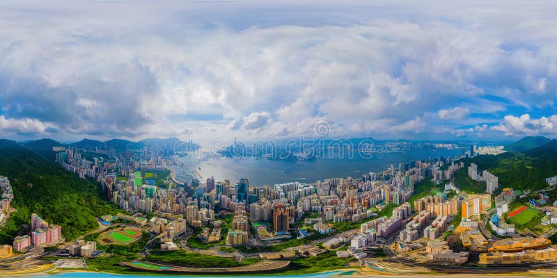 360 panorama by 180 degrees angle seamless panorama view of aerial view of Hong Kong Downtown. Financial district and business