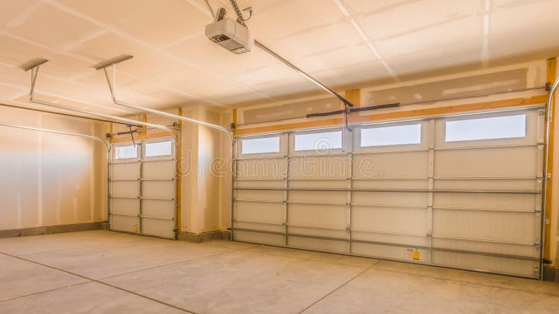 Interior Of An Unfinished Garage With Unpainted Walls And Ceiling