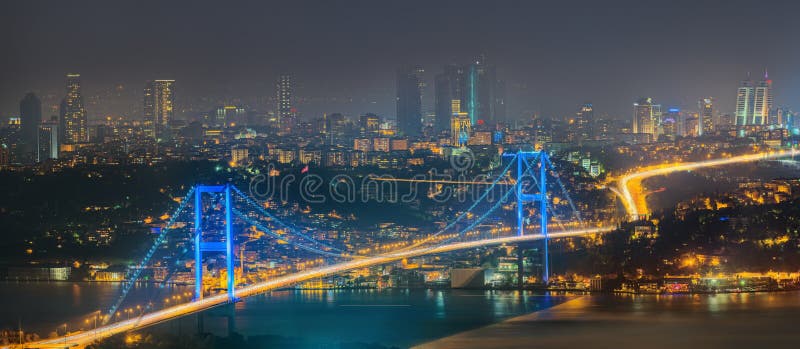 Panorama of Istanbul and Bosporus at night. Coast, channel.