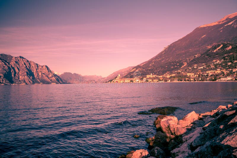 Panorama of Lake Garda (Italy) near the town of Malcesine. Panorama of Lake Garda (Italy) near the town of Malcesine called the pearl of the lake stock photos Panorama of Lake Garda (Italy) near the town of Malcesine. Panorama of Lake Garda (Italy) near the town of Malcesine called the pearl of the lake stock photos