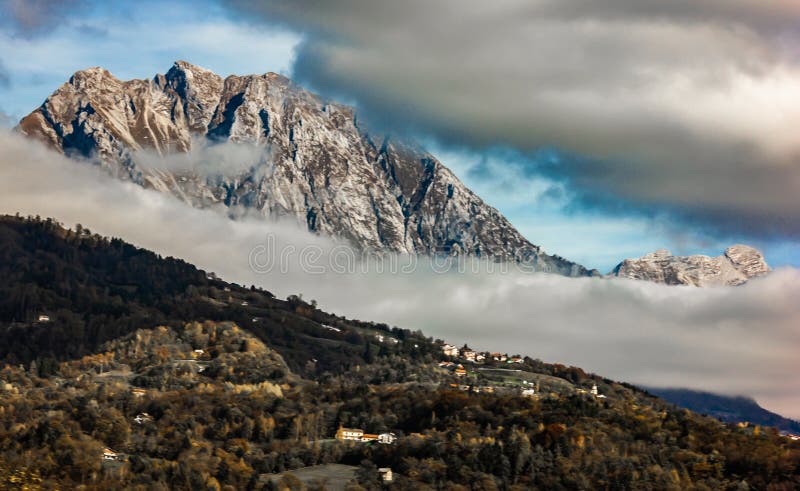 panorama of the lake of Santa Croce seen from the village of Alpago beautiful areas surrounded by mountains at an hour from the royalty free stock photos panorama of the lake of Santa Croce seen from the village of Alpago beautiful areas surrounded by mountains at an hour from the royalty free stock photos