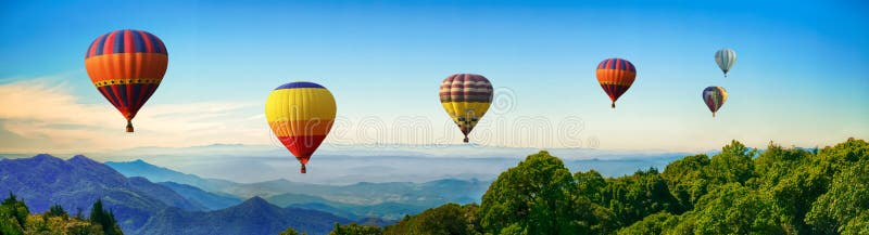 Panorama of mountain with hot air balloons on morning royalty free stock photos Panorama of mountain with hot air balloons on morning royalty free stock photos