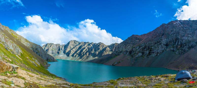 Panorama mountain lake Ala-Kul, Kyrgyzstan.