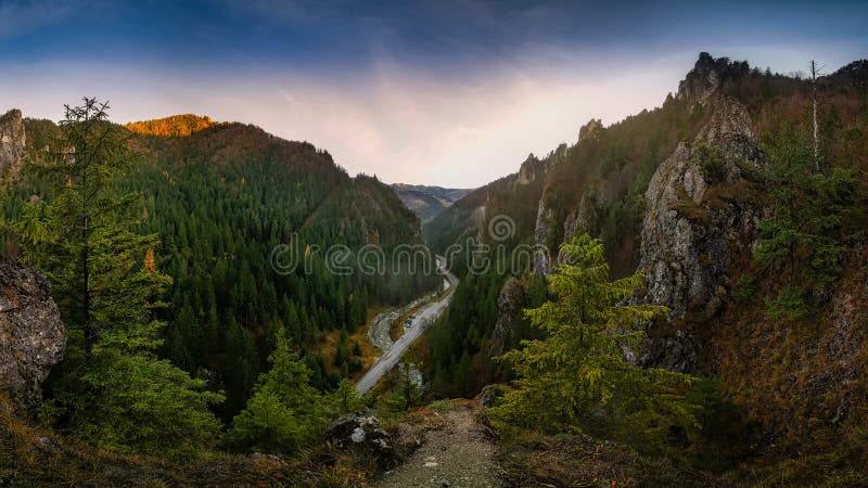 Panorama of mountains above the river and the way down