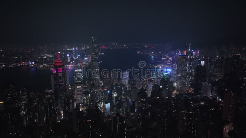 Panorama nocturne de tout le hong kong illuminé clips vidéos