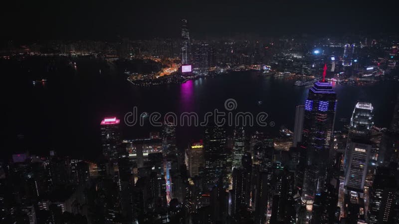 Panorama nocturne de tout le hong kong illuminé clips vidéos
