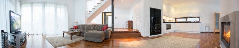 Panoramic view of modern interior with living room and kitchen. Panoramic view of modern interior with living room and kitchen