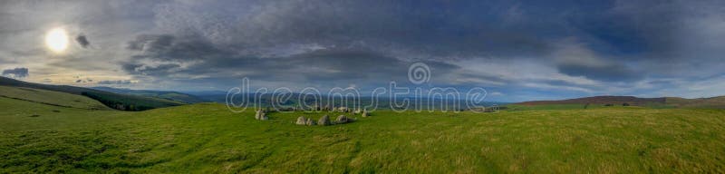 Panorama of stone circle Moel Tŷ Uchaf in Wales. Moel Tŷ Uchaf is a stone circle near the village of Llandrillo, Denbighshire, North Wales. It is a collection royalty free stock images Panorama of stone circle Moel Tŷ Uchaf in Wales. Moel Tŷ Uchaf is a stone circle near the village of Llandrillo, Denbighshire, North Wales. It is a collection royalty free stock images