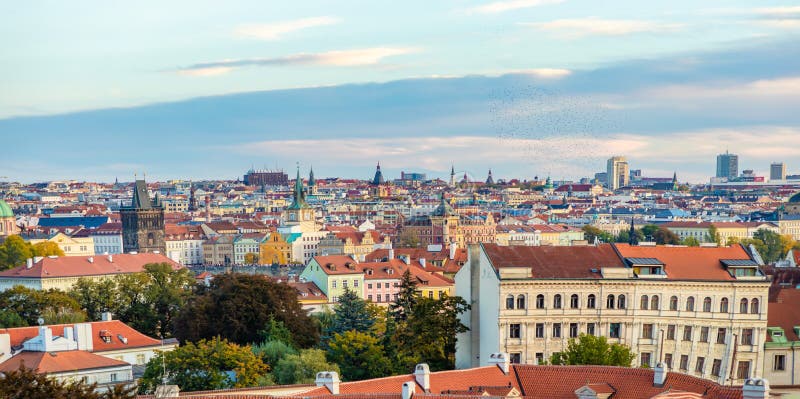 Panorama view of Prague city with red roofs and cathedral in sunset time, autumn in Prague, Czech Republic stock photos Panorama view of Prague city with red roofs and cathedral in sunset time, autumn in Prague, Czech Republic stock photos