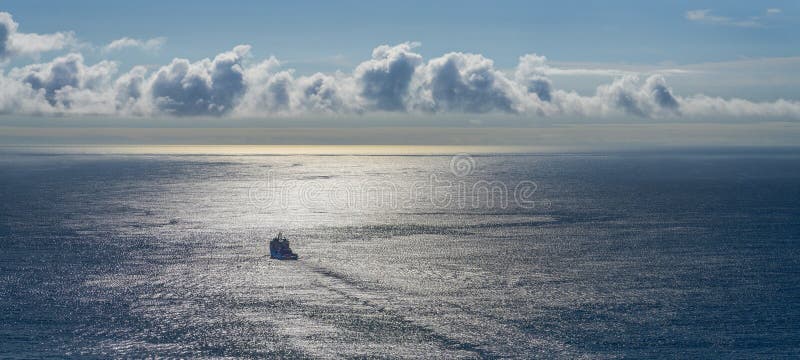 panorama view of a ship heading out to sea