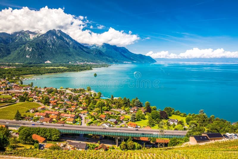 Panorama view of Villeneuve city with Swiss Alps, lake Geneva and vineyard on Lavaux region, Canton Vaud, Switzerland, Europe