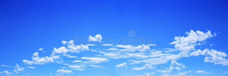 Panorama of white clouds on blue sky for background and design royalty free stock photo