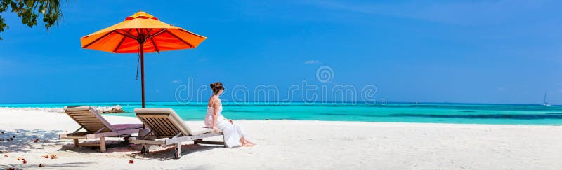 Young woman relaxing at beach royalty free stock image Young woman relaxing at beach royalty free stock image