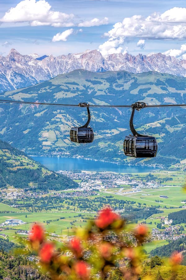 Panoramatic modern Cable cars against town of Zell am See  in the Zell am See-Kaprun region, Kitzsteinhorn, Austrian Alps, Salcbur