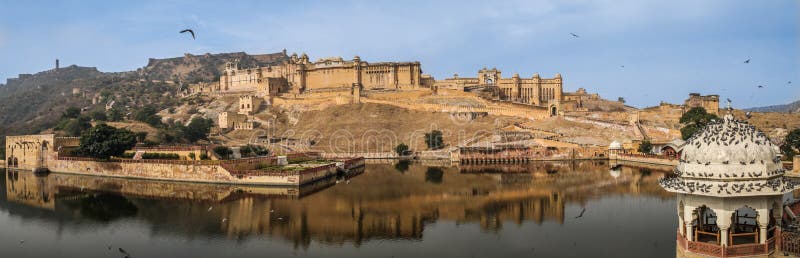 Amer Fort is a fort located in Amer, Rajasthan, India. Amer is a town with an area of 4 square kilometres 1.5 sq mi located 11 kilometres 6.8 mi from Jaipur, the capital of Rajasthan. Located high on a hill, it is the principal tourist attraction in Jaipur. The town of Amer was originally built by Meenas, and later it was ruled by Raja Man Singh I December 21, 1550 – July 6, 1614. Amer Fort is known for its artistic Hindu style elements. With its large ramparts and series of gates and cobbled paths, the fort overlooks Maota Lake, which is the main source of water for the Amer Palace. Amer Fort is a fort located in Amer, Rajasthan, India. Amer is a town with an area of 4 square kilometres 1.5 sq mi located 11 kilometres 6.8 mi from Jaipur, the capital of Rajasthan. Located high on a hill, it is the principal tourist attraction in Jaipur. The town of Amer was originally built by Meenas, and later it was ruled by Raja Man Singh I December 21, 1550 – July 6, 1614. Amer Fort is known for its artistic Hindu style elements. With its large ramparts and series of gates and cobbled paths, the fort overlooks Maota Lake, which is the main source of water for the Amer Palace.