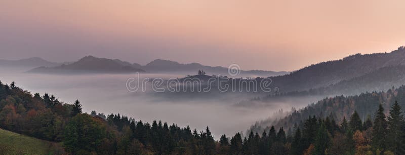 Panoramic foggy landscape at dawn over mountain and valley royalty free stock photo Panoramic foggy landscape at dawn over mountain and valley royalty free stock photo