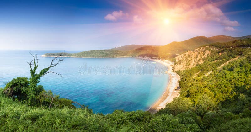 Panoramic landscape of the rocky coastline sea and Jaz Beach at sunshine. Budva, Montenegro. Adriatica. Top view royalty free stock images Panoramic landscape of the rocky coastline sea and Jaz Beach at sunshine. Budva, Montenegro. Adriatica. Top view royalty free stock images