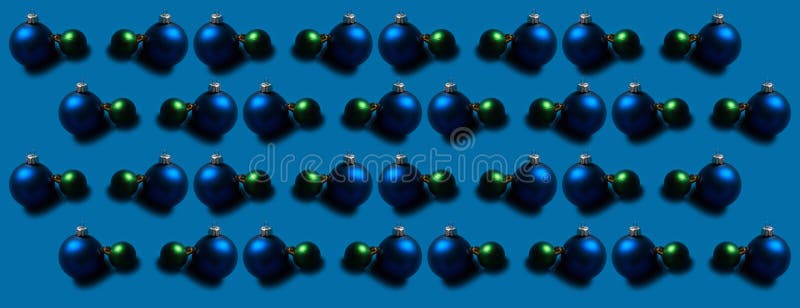 Panoramic pattern of Christmas tree toys on blue background. royalty free stock photo