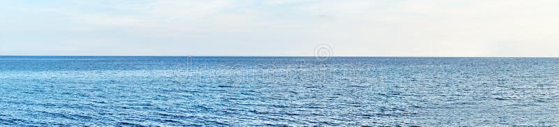 Panoramic shot of beach with blue sky. royalty free stock photos