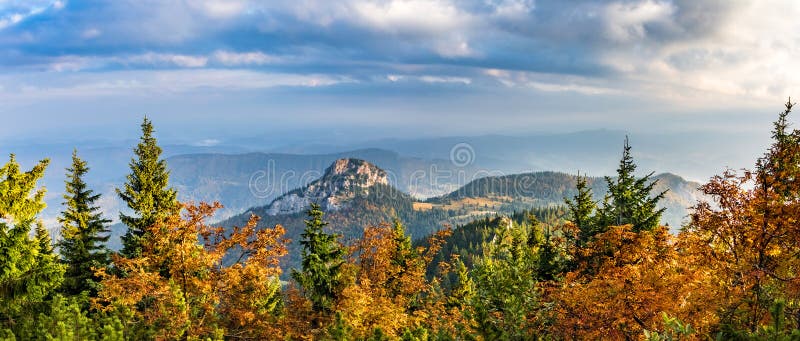 Panoramic shot of stony Little Rozsutec hill in autumn landscape