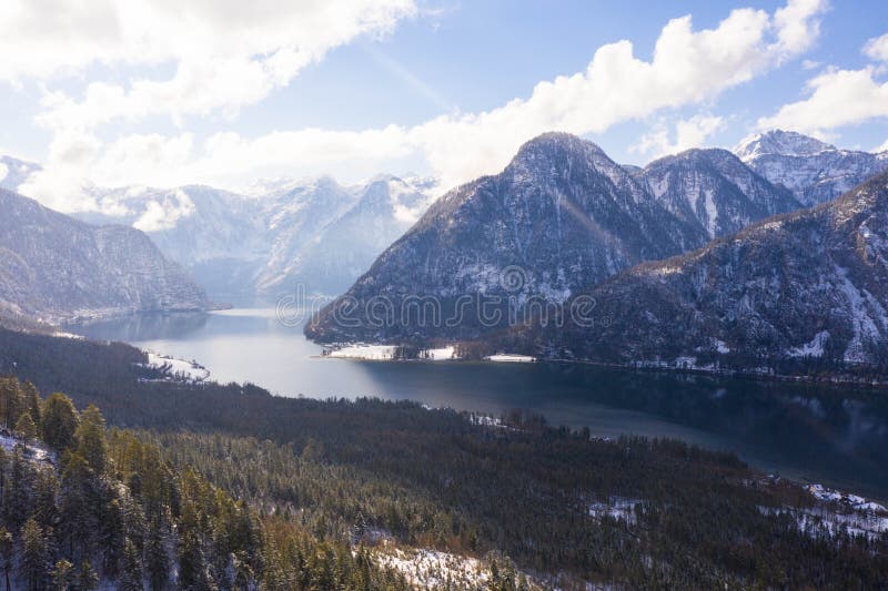 Winter Alpine lake Grundlsee. Embedded in the wonderful mountain massif of the Dead Mountains. Clear cold landscape with blue sky