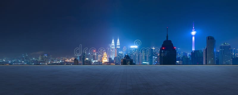 Panoramic view of empty concrete tiles floor with city skyline