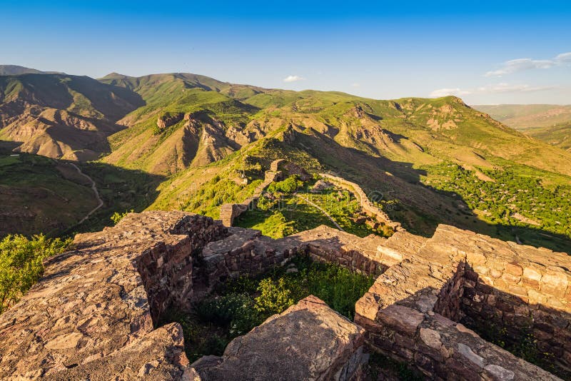 Fotografia do Stock: Smbataberd (Armenian meaning Fortress of Smbat Prince  of Syunik) is located upon crest of hill between villages of Artabuynk and  Yeghegis in Vayots Dzor in Armenia. Medieval Smbataberd Fortress.