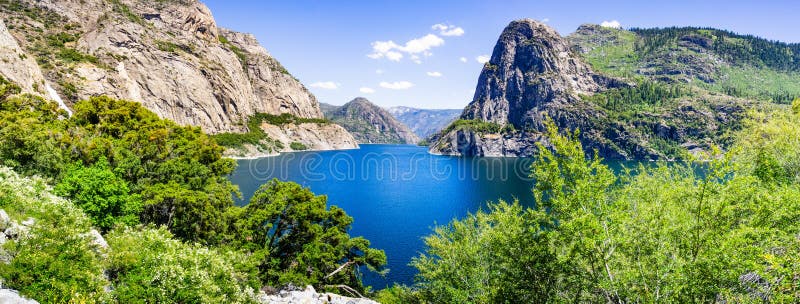 Panoramic view of Hetch Hetchy reservoir; Yosemite National Park, Sierra Nevada mountains, California; the reservoir is one of the