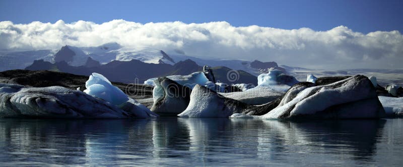 Panoramic view of icebergs and glaciers