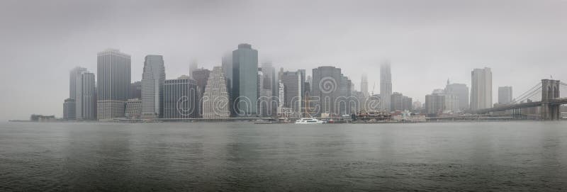 Panoramic view of Lower Manhattan on a foggy morning - NYC royalty free stock image Panoramic view of Lower Manhattan on a foggy morning - NYC royalty free stock image