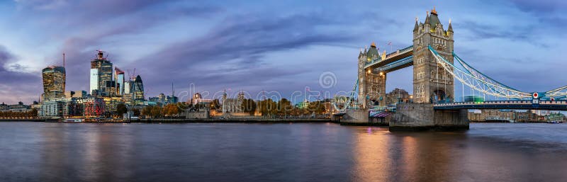 Panoramic view of the skyline of London during evening: from the Tower Bridge to the City of London