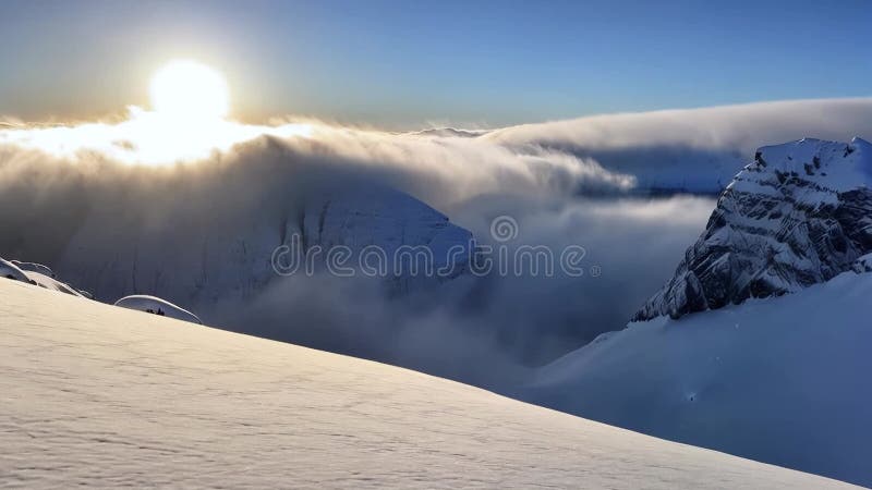 Panoramic view to summit and snow peaks with beautiful sunlight. Scenery view down on snow covered valley. stock illustration