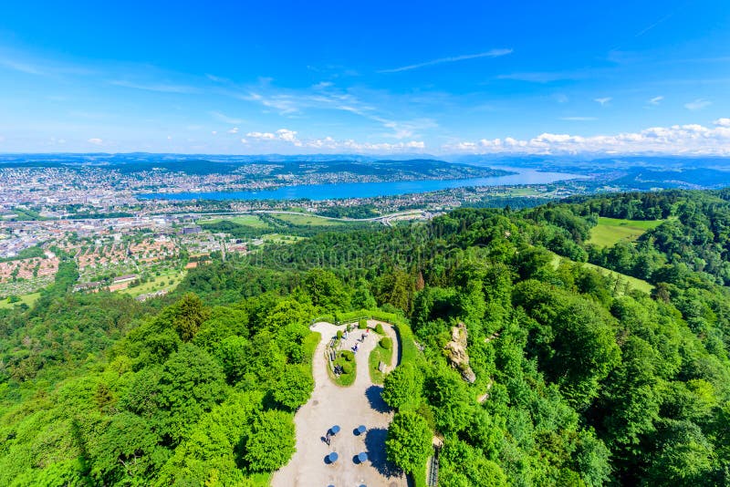 Panoramic view of Zurich lake and Alps from the top of Uetliberg mountain, from the observation platform on tower on Mt. Uetliberg