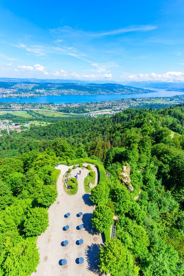 Panoramic view of Zurich lake and Alps from the top of Uetliberg mountain, from the observation platform on tower on Mt. Uetliberg