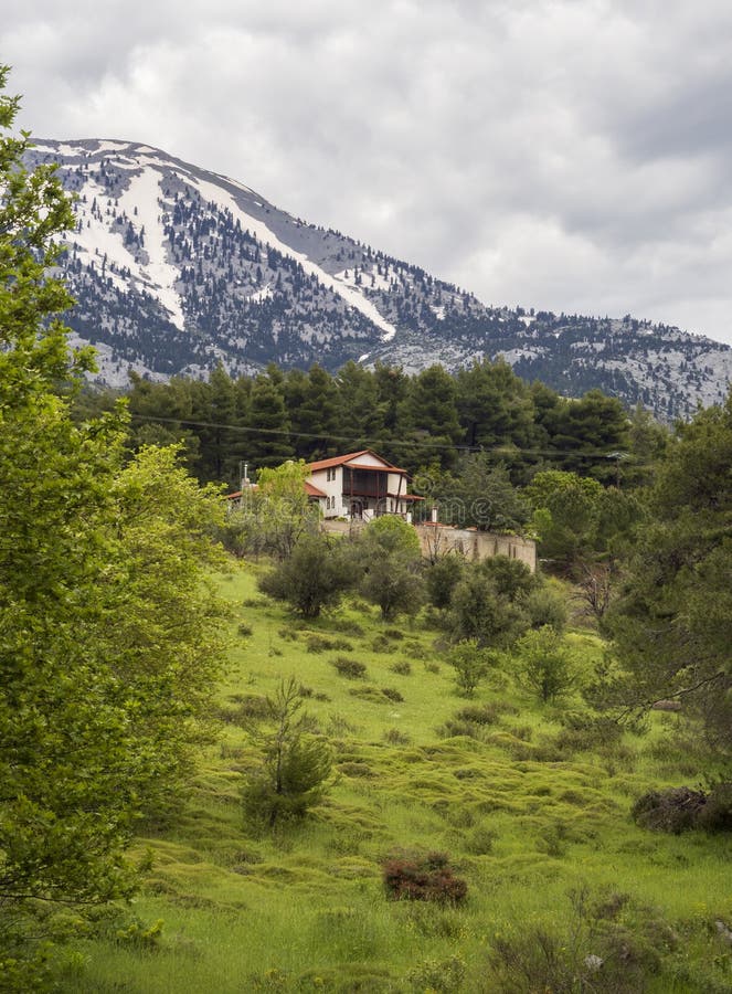 Panoramic view of the mountains in the snow, chalets and forest on the Greek  island of Evia, Greece. Panoramic view of the mountains in the snow, chalets and forest on the Greek  island of Evia, Greece