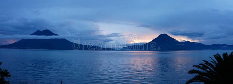 Splendid sunset view in Guatemala on lake Atitlan with volcanoes. Splendid sunset view in Guatemala on lake Atitlan with volcanoes