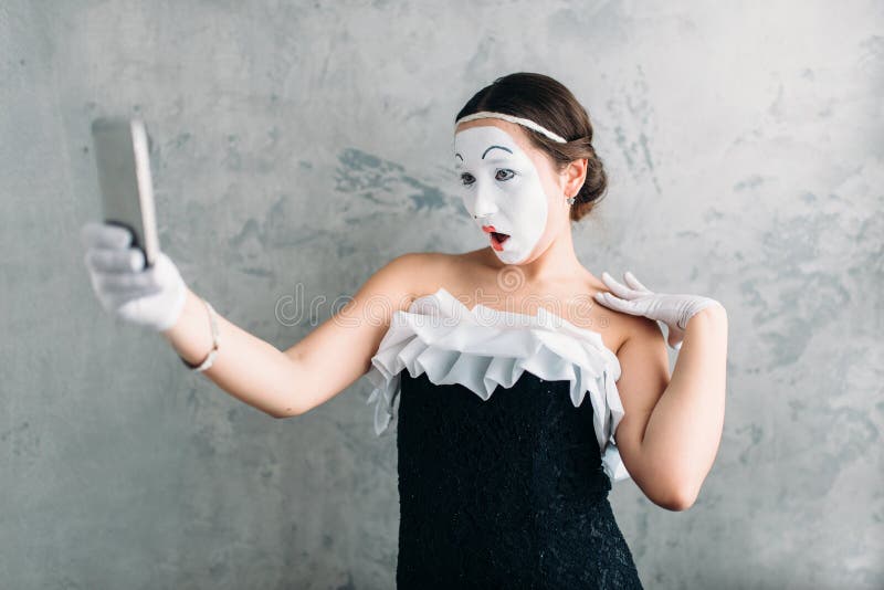 Pantomime theater actress makes selfie on camera stock photos Pantomime theater actress makes selfie on camera stock photos